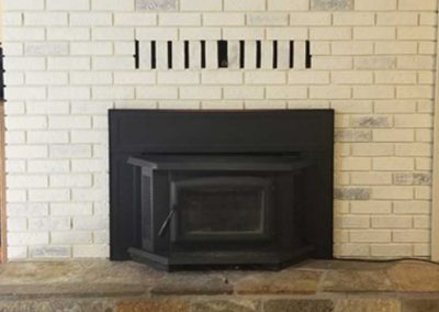 Huttons old brick fireplace before Hutton’s Interior Decorating